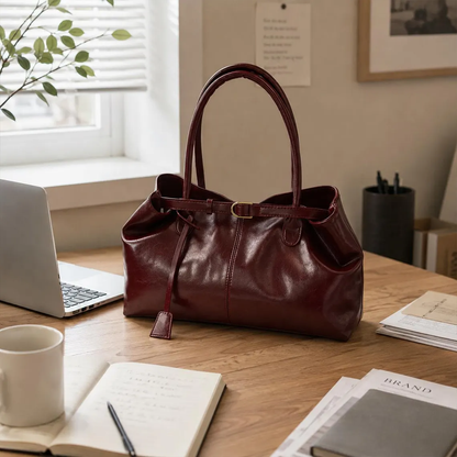 Retro Schultertasche mit Gürtelverschluss, Quastenbesatz und großem Innenstauraum